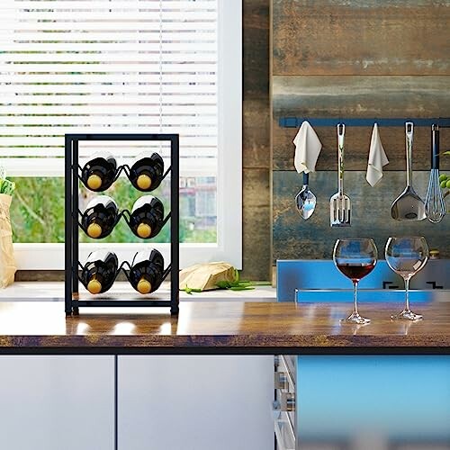 Kitchen with a wine rack and glasses on the counter.