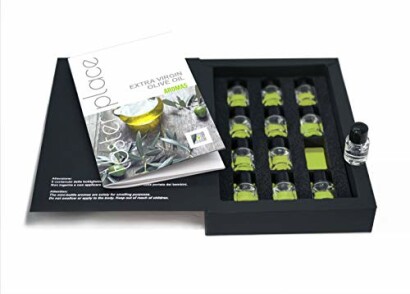 Olive oil tasting kit with bottles and booklet.