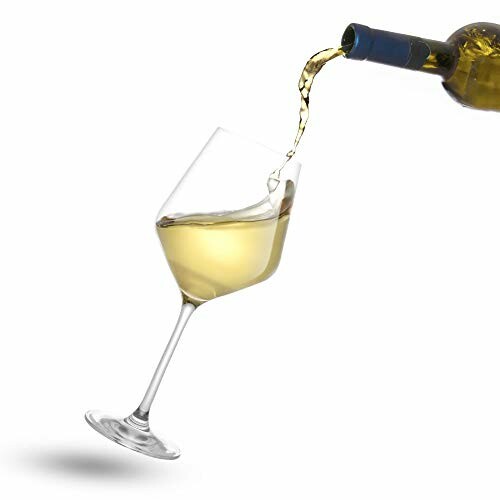 White wine being poured into a glass.