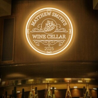 Matthew Smith's Wine Cellar sign with bottles beneath